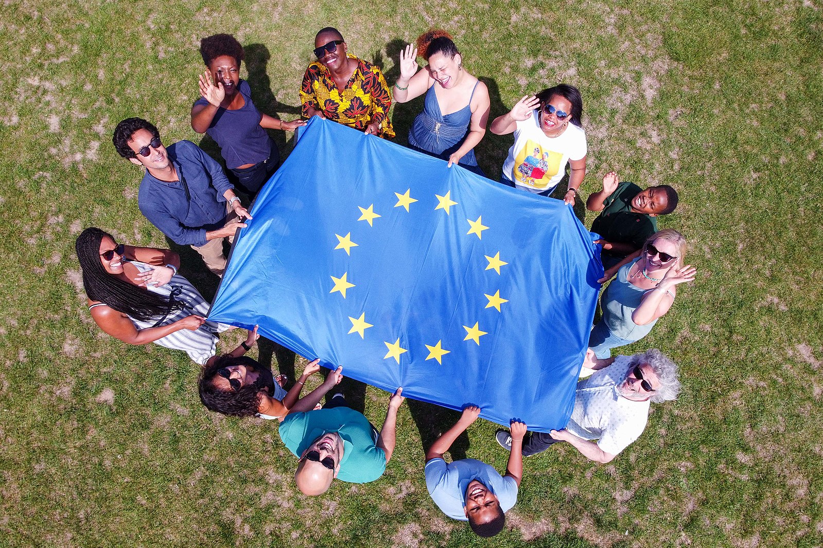 People holding a European flag